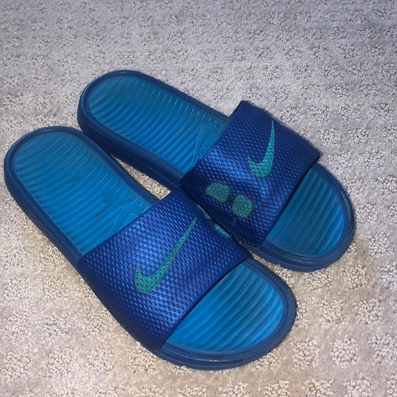 all blue nike slides